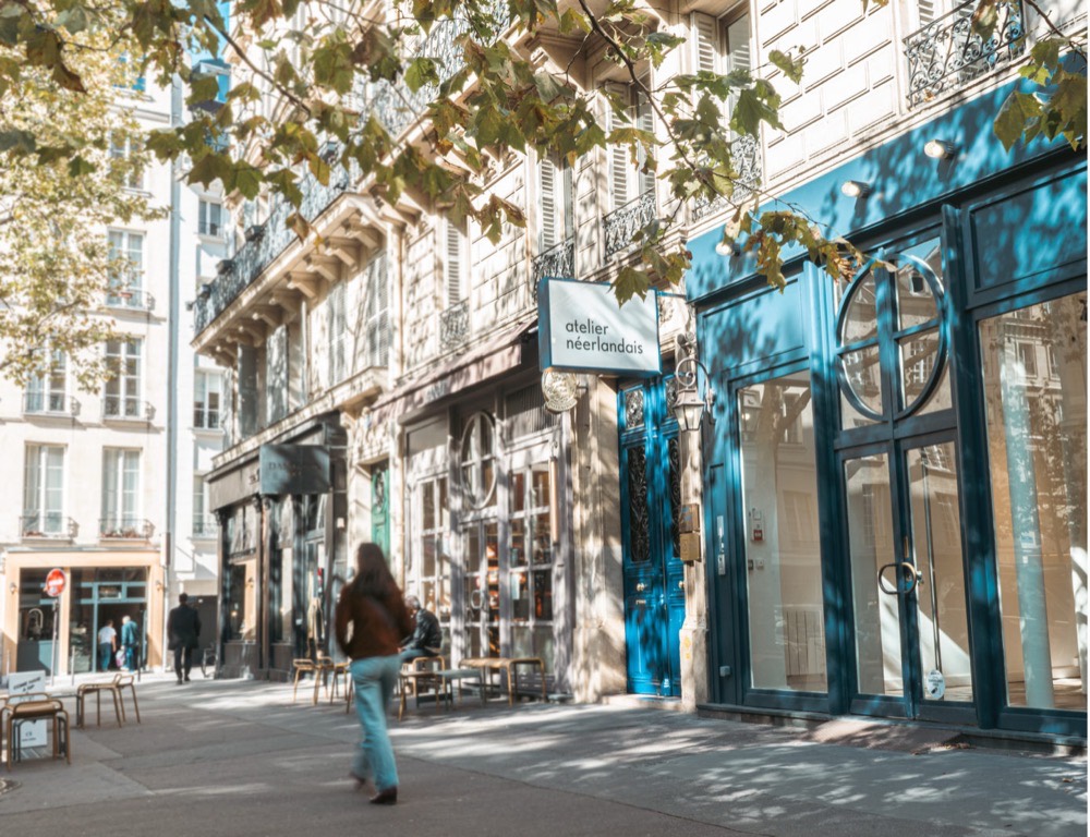 The Atelier N&eacute;erlandais on Avenue Victoria, its blue shopfront on a Paris street