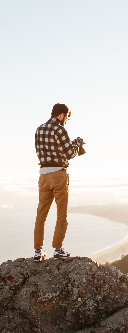 Wesley Verhoeve photographing, alone in open landscape